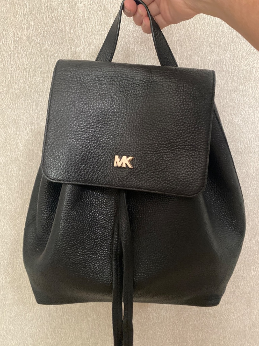 MK Junie Medium pebbled leather flap backpack